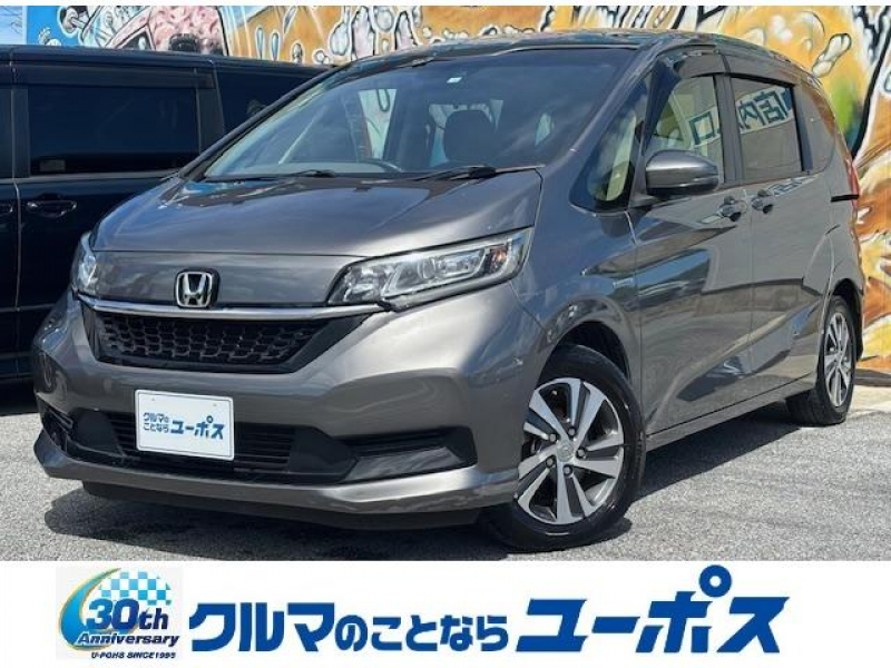 ホンダ フリード＋ ハイブリッドG・ホンダセンシング　　純正SDナビ　バックモニター　ドライブレコーダー　レーダークルーズコントロール　ステアリングスイッチ　シートヒーター　コーナーセンサー　両側パワースライドドア　ETC