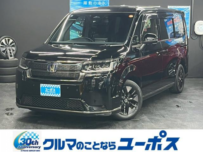 ホンダ ステップワゴン e：HEVスパーダ　OP10年保証対象車　9インチホンダコネクトナビ　バックモニター　両側パワースライドドア　パワーバックドア　オットマン　クリアランスソナー　クルーズコントロール　ETC　BSM　ステアリングスイッチ