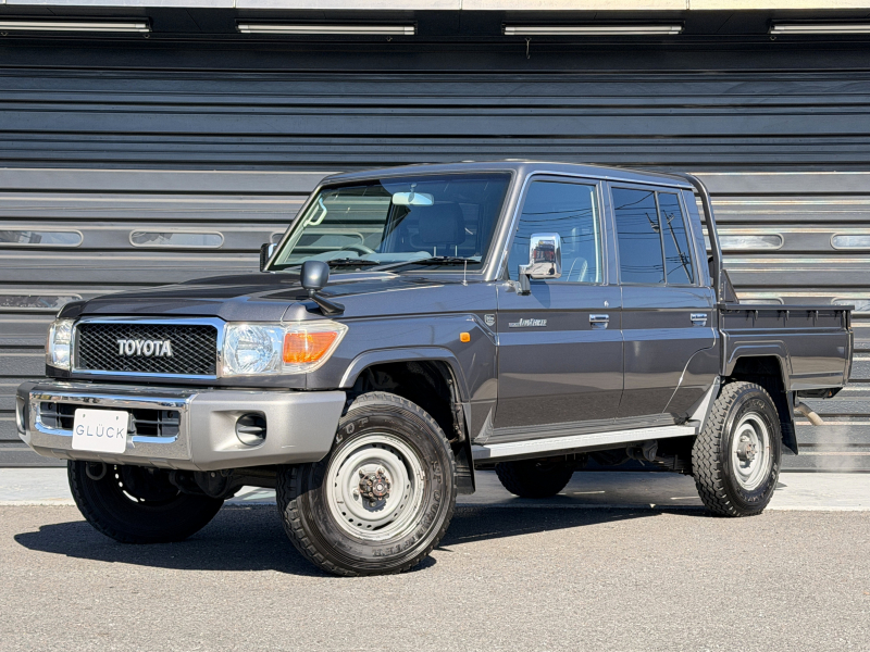 トヨタ ランドクルーザー 70ピックアップ4.0 4WD 30周年記念モデル 禁煙車 V6 5MT レザー調シートカバー バックカメラ デジタルテレビ CD Bluetooth接続  ETC パワステ パワーーウィンドウ 前後デフロック サイドステップ 純正16インチ