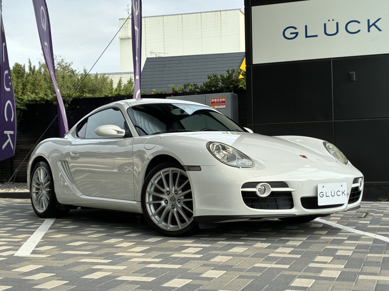 ポルシェ ケイマン(Type987) LHD 5MT　クルコン 19インチAW ナビ バックカメラ バイキセノンライト F/Rフォグ PSM TPMS オートエアコン ハーフレザーシート 電動リアスポイラー スポーツステアリング フルセグチューナー ヘッドライトウォッシャー ETC車載器