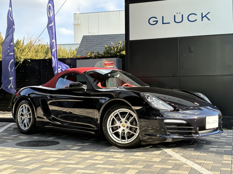 ポルシェ ボクスター(Type981) ボクスター  左ハンドル 6速MT 赤革　 純正ナビ バックカメラ 2Way電動シート レッドソフトトップ 純正18インチA/W 電動格納ドアミラー SPORTモード バイキセノンヘッドライト スポーツシート ブラックキャリパー